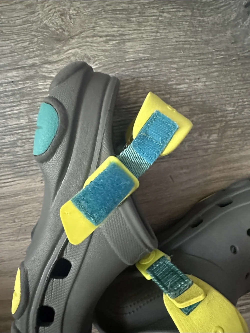 CROCS all terrain Clogs in Gray with Yellow Heel Strap kids size J1